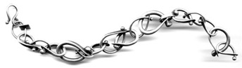 CURVE $260-sterling silver bracelet with sanding disk texture on hammered portions of varying size and gauge links (7 1/2" long) CURVE $260-sterling silver bracelet with sanding disk texture on hammered portions of varying size and gauge links (7 1/2" long)